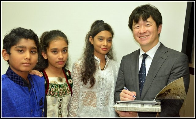 Kaoru Miyamoto and children from the gas disaster-affected families