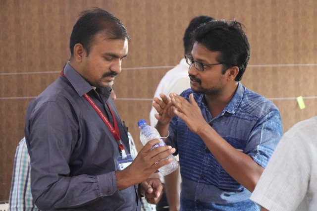 Teachers discussing about the activity.