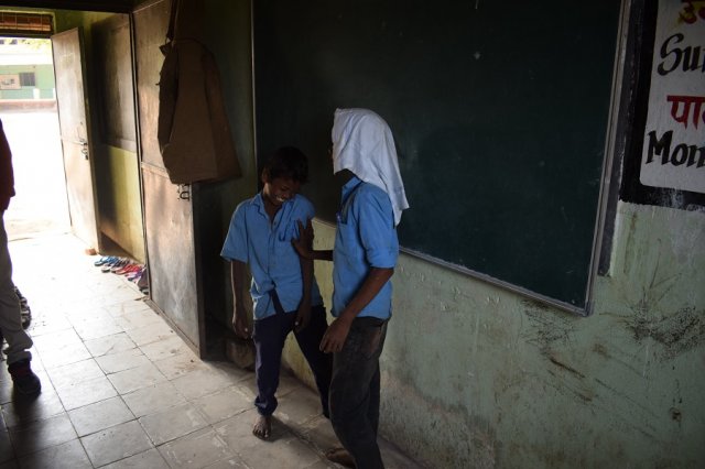 Students of class 4th performing a short play.